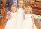 Wade Johns with his three girls, Grace, Caroline, and Kate. Living in east Dallas, they get to experience the big city and Pittsburg, learning lessons that both have to offer. COURTESY PHOTO Small town confidence in the big city