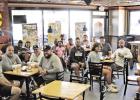 Quite a crowd of football coaches and trainers enjoyed breakfast, courtesy of Golden Chick owned by Mike and Jen Jenson on August 1. Golden Chick provides a special meal for the athletic coaches and trainers each year, as a thank you for their work and ti Golden Chick continues annual tradition