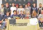 Dalton Hall (center, sitting) with family, friends, and teammates. GAZETTE PHOTO / ELIZABETH LANNING Dalton Hall to play baseball for East Texas Baptist University