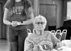 Elora Dixon, Lion Peach Queen candidate and Barbara Horch, Lion member.