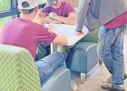 Some of the students were pulling out calculators to keep from ending in debt. TRIBUNE PHOTOS / ELIZABETH LANNING Mad City Day at NTCC