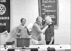 COURTESY PHOTO / ERIC FRUIN Rotary District Governor Judy Guthrie (left) presided over the installation of a new Pittsburg Rotary President Kay Green. Guthrie observes as outgoing Rotary President Carolyn Franks (center) pins the new President, and later passed the gavel to Green (right). Article Image Alt Text