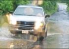 GAZETTE PHOTO / ELLIS KNOX A pickup drives through high water on a Camp County road during last week’s deluge of rainfall that closed roadways and sparked a high-water rescue. Article Image Alt Text
