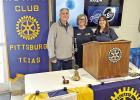 Rotarian John Livingston (left) is pictured with his special guest Sandy Thompson (center) and Angela Saucier, President of the Pittsburg Rotary Club. COURTESY PHOTOS Rotary, Lions Clubs team up to purchase eclipse glasses for Pittsburg schools