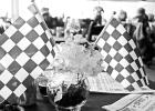 Tables were decorated in proper style to honor a famous race car driver. GAZETTE PHOTOS / ELIZABETH LANNING Centennial recalls anniversary of Carroll Shelby’s 100th birthday