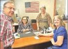 COURTESY PHOTO God’s Closet’s staff joins Rachel Miner of Guaranty Bank & Trust as the ministry pays off its building after 26 months of purchasing it. Pictured, from left, is Ken Smerdon, Miner, June Parks and Alethea Smerdon. Article Image Alt Text