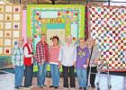 Left to right: Gayle Boas, Faye Tigert, Vicki Russell, Mary Jane Tigert, Sandy Agan (Sunshine Group), and Tommie Clements and Colleen Turner (Five Point Quilters) showcase their handiwork. Handmade quilts offer beauty and warmth