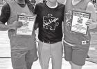 Left to right: Sanaa Hollins, Coach Chatham, and Natalie Styles at the annual Hoops for Autism games. COURTESY PHOTO Hoops for Autism