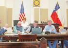 Commissioners propose decreasing the county tax rate by three cents per $100 of property valuation. GAZETTE PHOTO / ELIZABETH LANNING Article Image Alt Text