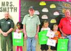 Second grade students awarded by Masons for reading challenge