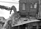 Excavator takes a might blow to the rear of the building on Church Street Excavator takes a might blow to the rear of the building on Church Street