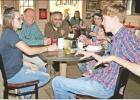 GAZETTE PHOTO / LYNDA STRINGER The Libertarian party’s nominees for the top three state races visit with constituents at Anvil Brewing in Pittsburg Oct. 14. Pictured, from left is Madlen Krause, Camp County Libertarian Party Cha Article Image Alt Text