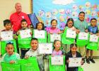 Second grade students awarded by Masons for reading challenge