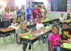 Third graders gifted headphones from Rotary Club