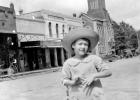 Little Miss Helen Jackson on Main Street in 1923. The old Courthouse stands in the background. What is now the Flying Cow is directly over her right shoulder. GAZETTE ARCHIVE PHOTO Article Image Alt Text