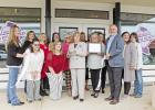 Purple Hearts Home Health cuts the ceremonial ribbon at their new location in downtown Pittsburg on Jefferson Street. GAZETTE PHOTO / KELSIE HOOPER Purple Hearts Home Health moves downtown