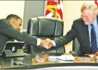 Mayor David Abernathy congratulates Councilmember Rico Willis after the council elected him mayor pro-tem Monday night. Article Image Alt Text