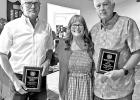 From left to right: “Rotarian of the Year” award recipient Bill Dixon, Rotarian Karen Ray, and “Rotarian of the Year” award recipient Woody Ray