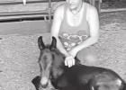 Lisa Wade sits with Joker a few days after his birth. GAZETTE PHOTOS / DI DUNCAN Article Image Alt Text