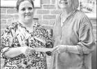 GAZETTE PHOTO / ELLIS KNOX The Pittsburg Rotary Club recently donated $250 to the Pittsburg-Camp County Library for its general fund. Pictured, from left, are Library Director Lily Marshall and Rotary Past President Carolyn Franks, making the presentation Article Image Alt Text