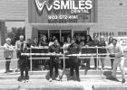 Brothers Husnain Shahad and Rehan Shahid cut the Pittsburg Chamber of Commerce ribbon for their location at 204 West 19th Street, Mt Pleasant, Texas.