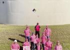 Welsh Employees pose in ribbon style! Pictured: Energy Production Supervisor Sarge Edwards, Material Handling Superintendent Neal Hallonquist, Engineer Principal Mike McMahon, Contractor Shannon Clawson, Long Range Planning Supervisor Richard Bradshaw, Se Power up for Pink