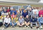 Members of the Pittsburg Rotary Club and Pittsburg Lions Club are pictured with the giant traveling eclipse glasses to commemorate their joint effort of providing eclipse glasses for local schools. COURTESY PHOTO Rotary, Lions Clubs team up to purchase eclipse glasses for Pittsburg schools