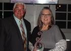 Traci Buckner, Educator of the Year, with Chamber President James Wallace. COURTESY PHOTO Annual Chamber Banquet lauds community members