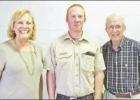 GAZETTE PHOTO / ELLIS KNOX Forester Kelby Wolf spoke to the Rotary club of Pittsburg about the programs and services of the Texas A&M Forest Service. Pictured are left to right: Kay Green - Rotary president, Forester Kelby Wolf, and Gary Carter, progr Representative of Forest Service speaks to Rotary