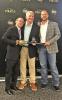 Assistant Athletic Director, John Chatham, Pittsburg ISD Superintendent, retiring, Terry Waldrep, and Athletic Director John Huffstetler. They gave him a sword inscribed as “Mr Wladrep, in all ways a Pirate”, and an inscribed pocket watch.