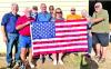 Rotarian Flag Project Committee preparing for distribution.